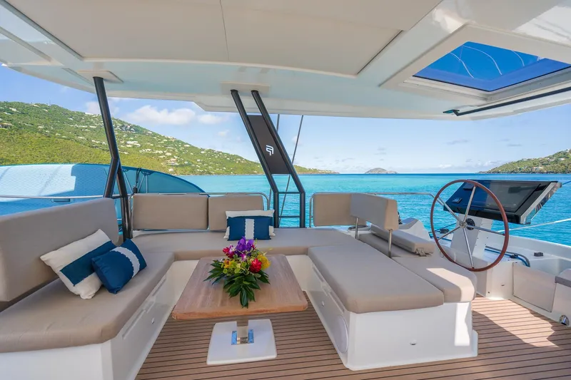 Jewel Yacht Photos Pics Luxurious 2023 Fountaine Pajot Alegria yacht interior with scenic ocean view.