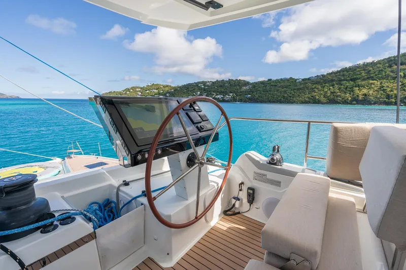 Jewel Yacht Photos Pics 2023 Fountaine Pajot Alegria yacht helm with scenic ocean view.