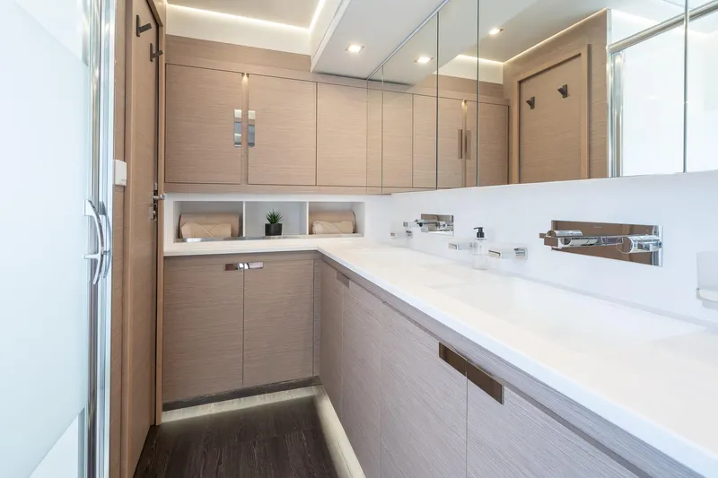 Jewel Yacht Photos Pics Luxurious bathroom interior on 2023 Fountaine Pajot Alegria yacht, featuring modern fixtures and sleek design.