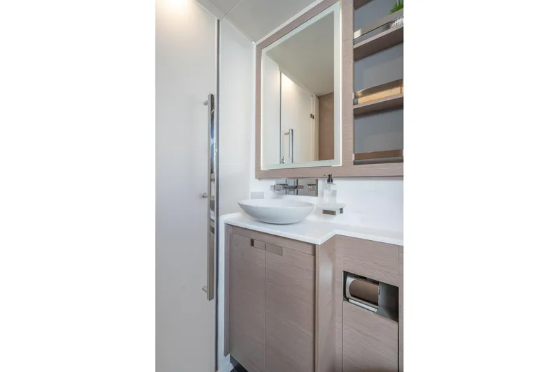 Jewel Yacht Photos Pics Modern bathroom in 2023 Fountaine Pajot Alegria yacht with sleek fixtures and elegant design.