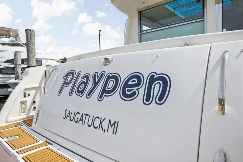 Playpen Yacht Photos Pics 2003 Tiara Yachts 5200 Sovran named "Playpen" docked in Saugatuck, MI.