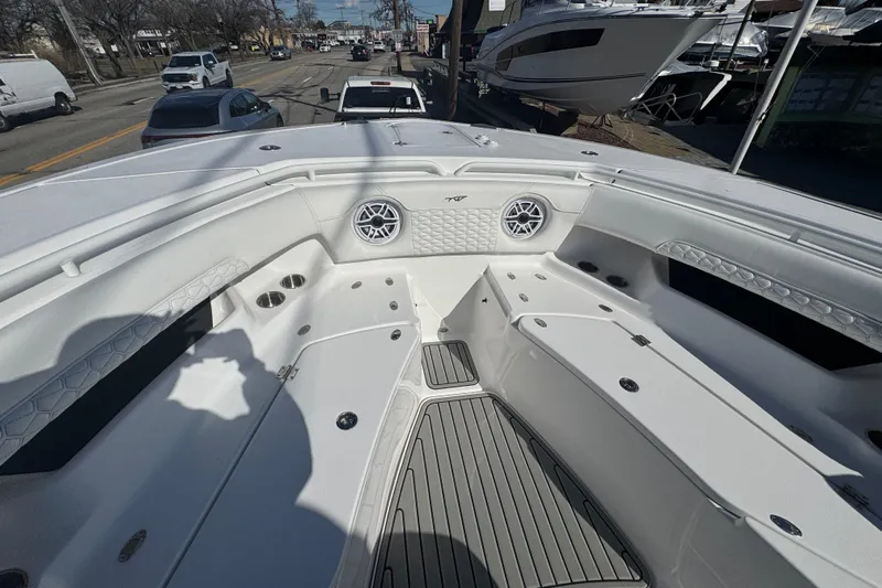  Yacht Photos Pics 2026 Tidewater 320 CC Adventure boat interior with seating and speakers.