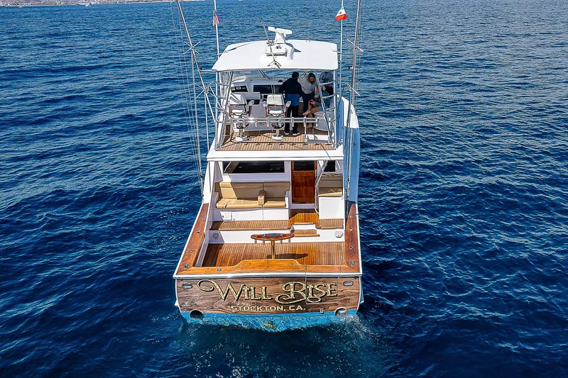 Will Rise Yacht Photos Pics Custom Carolina 58 yacht, 2005 model, named Will Rise on the ocean.