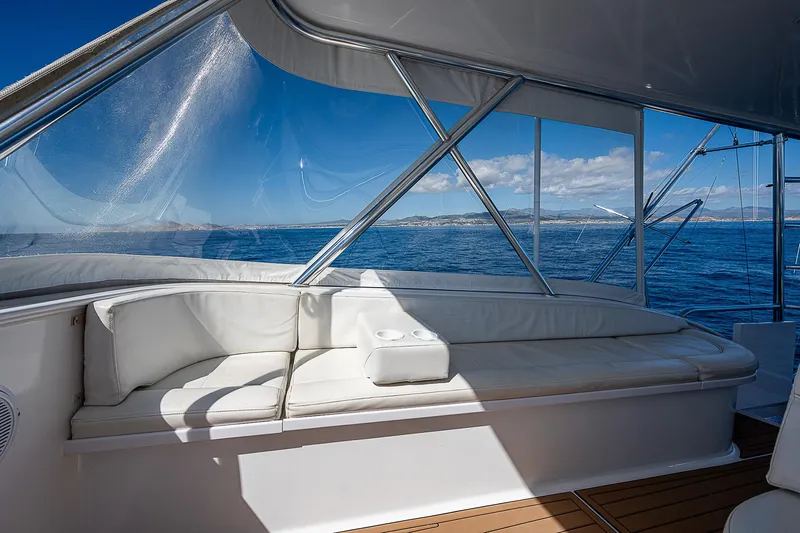 Will Rise Yacht Photos Pics Luxurious seating area on a 2005 Custom Carolina 58 yacht with ocean view.