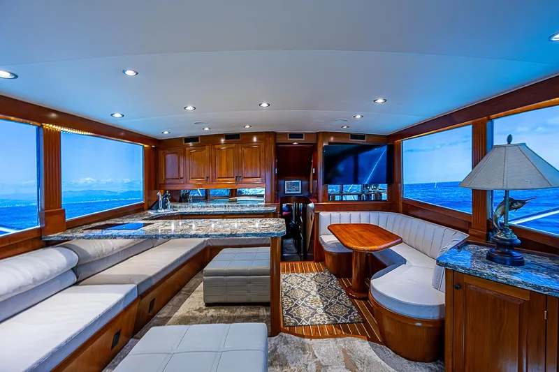 Will Rise Yacht Photos Pics Luxurious interior of 2005 Custom Carolina 58 yacht with panoramic ocean views.