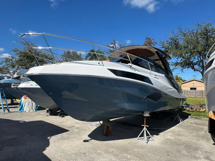  Yacht Photos Pics 2025 NX Boats NX340 on stands under a clear blue sky.