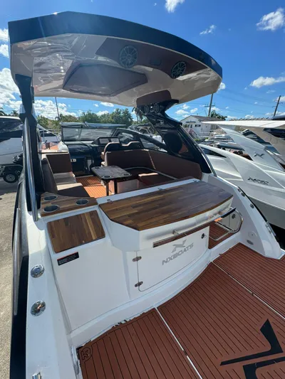  Yacht Photos Pics 2025 NX Boats NX340 luxury yacht with spacious deck and modern interior design.