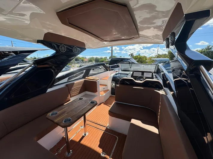  Yacht Photos Pics Luxurious interior of 2025 NX Boats NX340, featuring sleek seating and modern navigation systems.