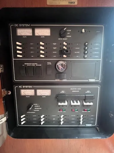 Getaway Yacht Photos Pics Electrical panel of 2001 Tiara Yachts 3500 Express, featuring DC and AC systems.