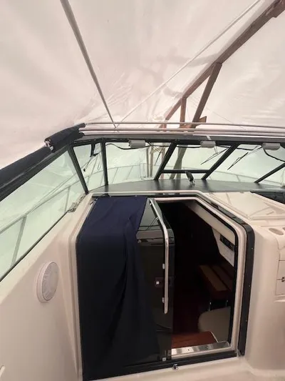 Getaway Yacht Photos Pics 2001 Tiara Yachts 3500 Express cabin entrance under protective cover.