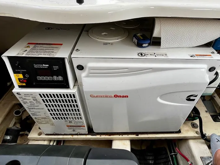 " Toes In The Sand " Yacht Photos Pics Cummins Onan marine generator in a 2011 Tiara Yachts Sovran.