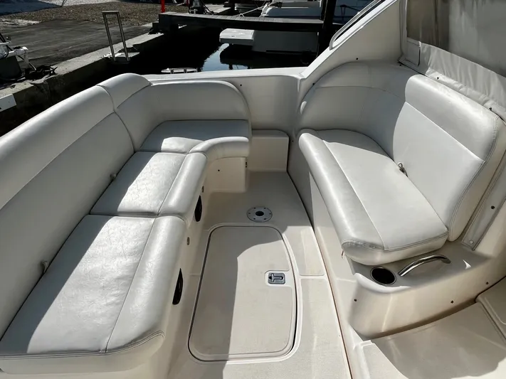 " Toes In The Sand " Yacht Photos Pics Interior of 2011 Tiara Yachts Sovran with white leather seating.