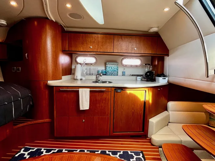 " Toes In The Sand " Yacht Photos Pics Interior of 2011 Tiara Yachts Sovran with modern kitchen.