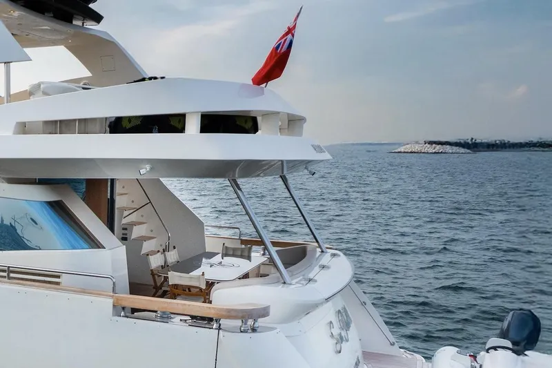  Yacht Photos Pics Luxury Aicon 85 yacht from 2015 on open water, featuring elegant design and spacious deck.
