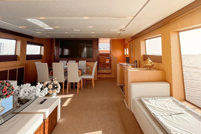  Yacht Photos Pics Luxurious interior of 2015 Aicon 85 yacht with elegant dining area and sea view.