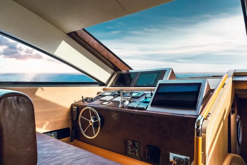  Yacht Photos Pics Luxurious Aicon 85 yacht helm with ocean view, featuring modern navigation controls, 2015 model.