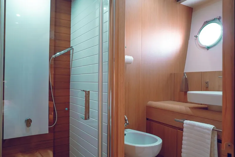  Yacht Photos Pics Luxurious bathroom in 2015 Aicon 85 yacht with modern fixtures and wooden accents.