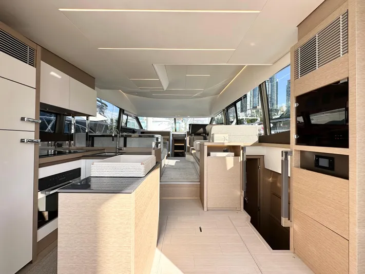 Pearl Voyage Yacht Photos Pics Luxurious interior of 2023 Prestige 520 yacht, featuring modern design and spacious layout.