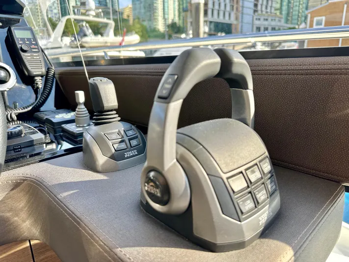 Pearl Voyage Yacht Photos Pics Control panel of a 2023 Prestige 520 yacht, featuring advanced navigation equipment.