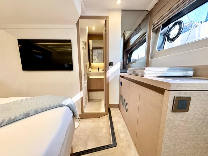 Pearl Voyage Yacht Photos Pics Luxurious interior of 2023 Prestige 520 yacht with modern furnishings and elegant design.