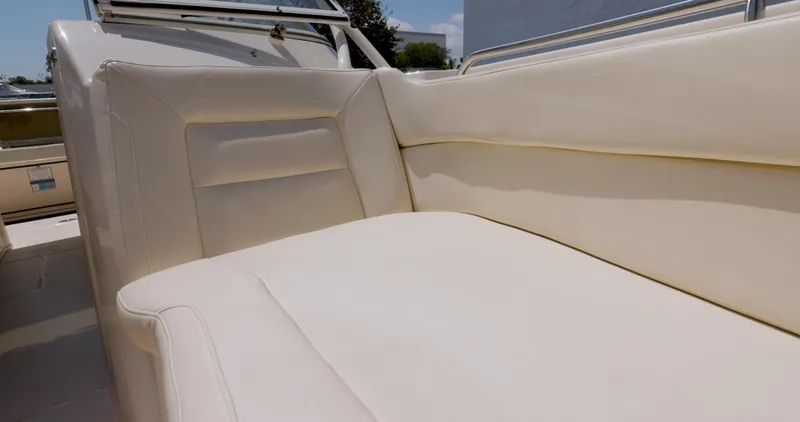 Yacht Photos Pics 2018 Grady-White Freedom 307 boat interior with cream-colored seating.