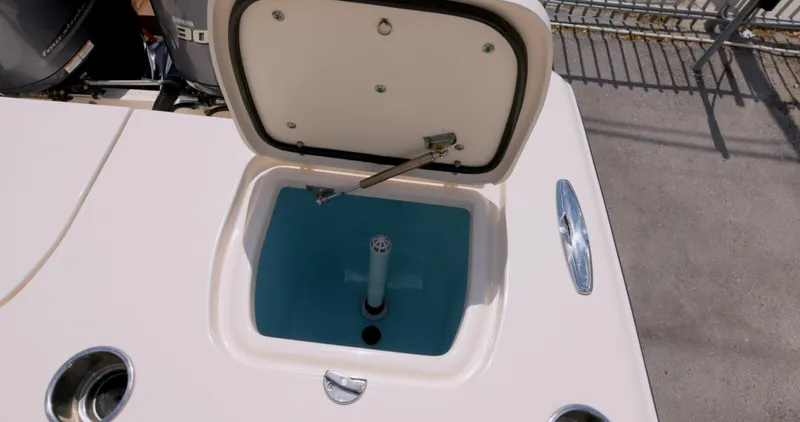  Yacht Photos Pics 2018 Grady-White Freedom 307 boat livewell with open lid, showcasing interior features.