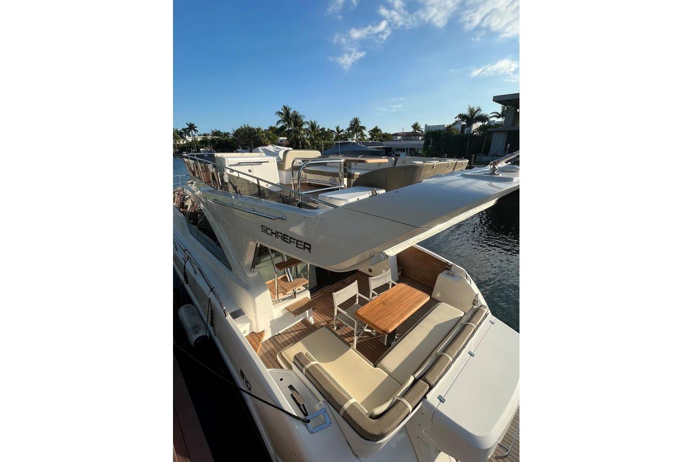 Luxury 2019 Schaefer 510 GT Pininfarina yacht portside cockpit overview.