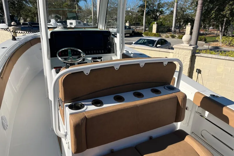  Yacht Photos Pics 2021 Sea Hunt Gamefish 27 Coffin Box boat interior with helm and seating.