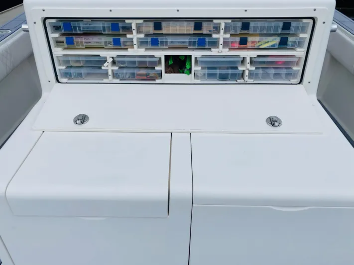 Part Time Hooker Yacht Photos Pics 2009 SeaVee IPS boat with organized tackle storage compartments.