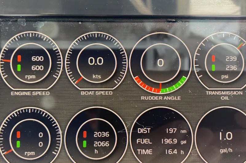 Part Time Hooker Yacht Photos Pics Dashboard of a 2009 SeaVee IPS boat showing engine speed, boat speed, and rudder angle.