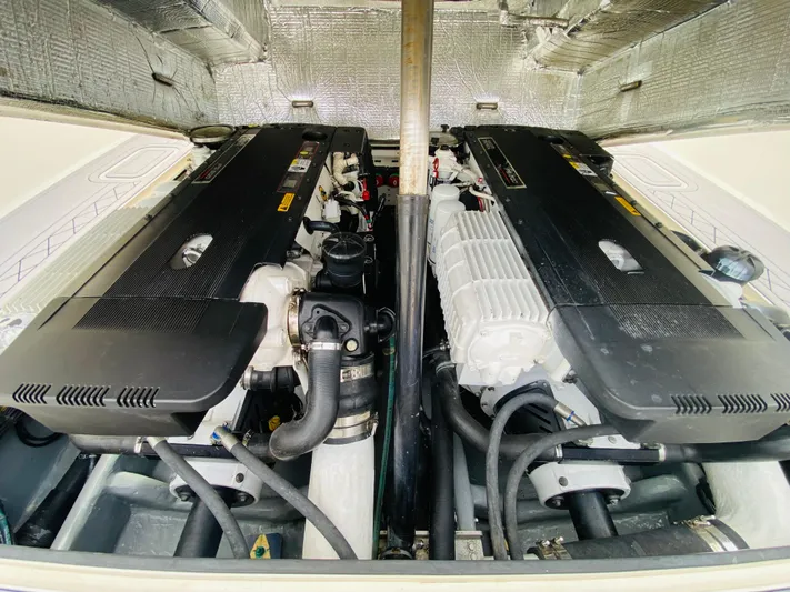 Part Time Hooker Yacht Photos Pics 2009 SeaVee IPS engine compartment showcasing dual engines and advanced marine technology.