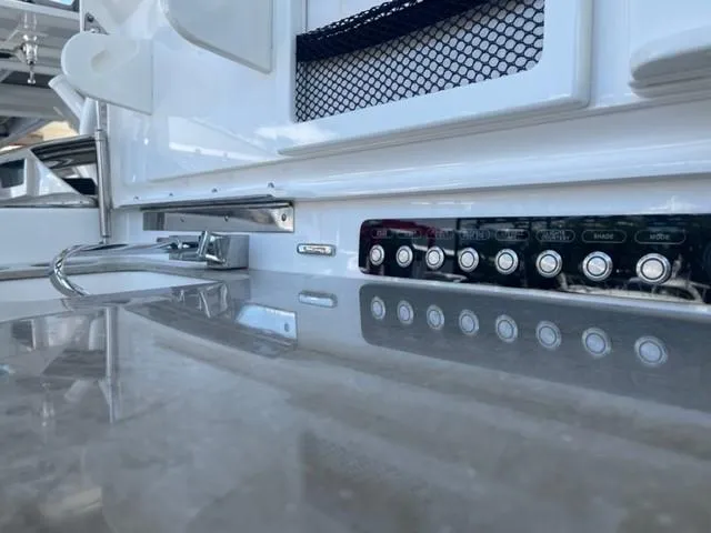 Inspiration II Yacht Photos Pics 2018 Boston Whaler 420 Outrage interior with control panel and sleek countertop.