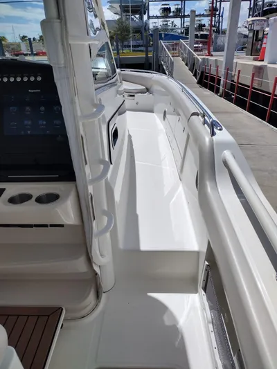 Inspiration II Yacht Photos Pics 2018 Boston Whaler 420 Outrage boat deck with modern controls and seating.