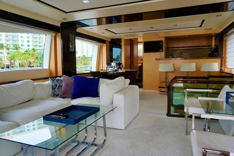  Yacht Photos Pics Luxurious interior of 2015 Azimut 84 yacht with modern furnishings and large windows.