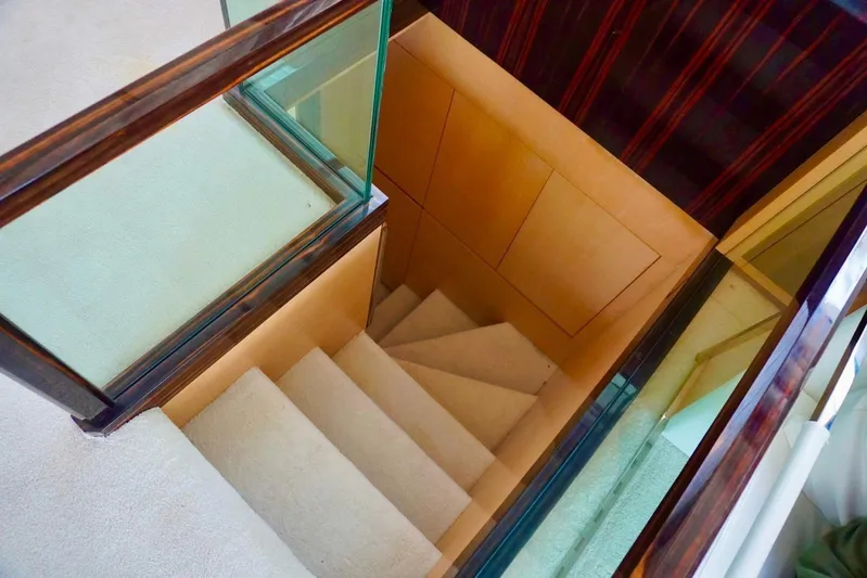  Yacht Photos Pics Staircase with glass railing inside 2015 Azimut 84 yacht.
