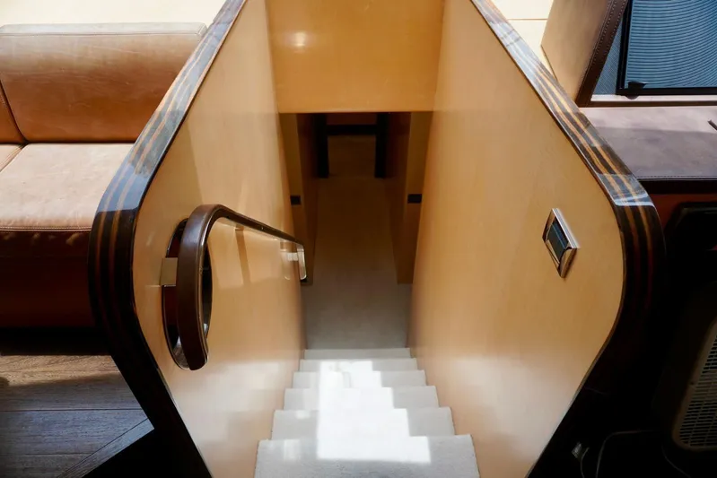  Yacht Photos Pics Staircase inside 2015 Azimut 84 yacht with elegant wooden handrails.