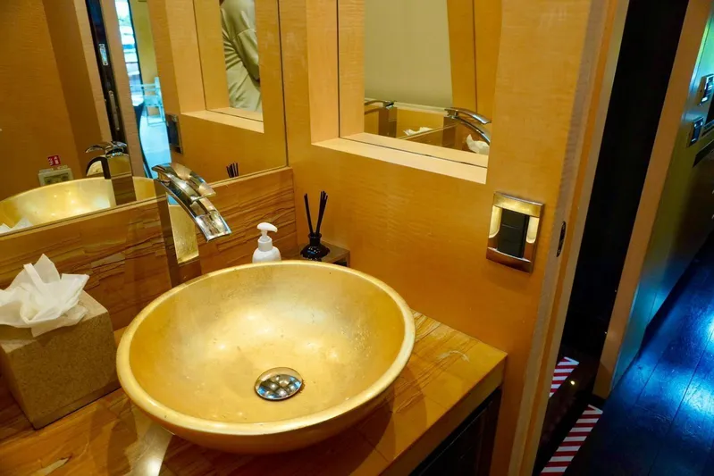  Yacht Photos Pics Luxurious bathroom on 2015 Azimut 84 yacht with elegant sink and modern fixtures.