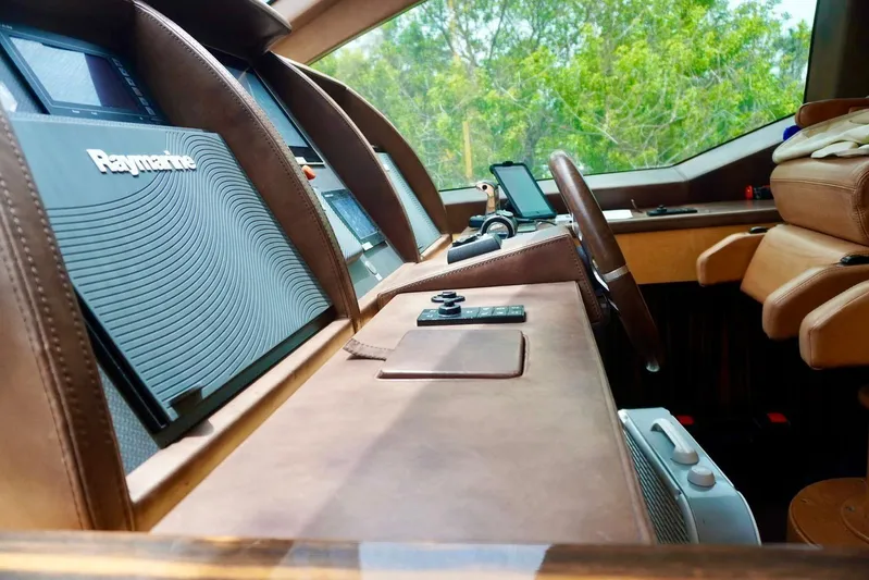  Yacht Photos Pics Luxurious helm of 2015 Azimut 84 yacht with Raymarine navigation system.