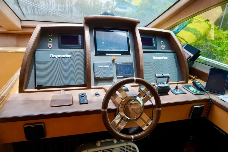  Yacht Photos Pics Helm of 2015 Azimut 84 yacht with Raymarine navigation system.