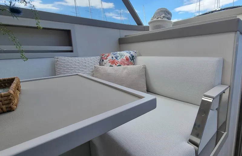 450 Rs Yacht Photos Pics Luxurious seating area on 2026 Monachus 450 RS yacht with cushions and table.