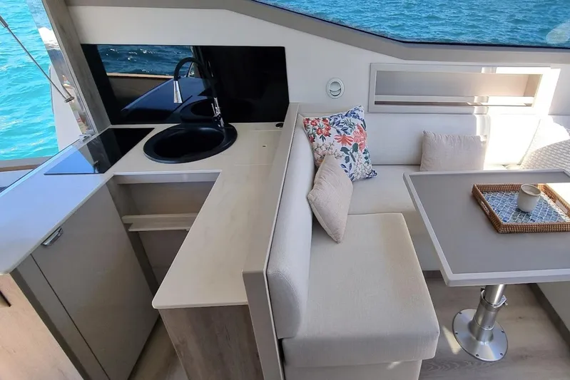 450 Rs Yacht Photos Pics Modern Monachus 450 RS yacht interior with kitchenette and cozy seating area, 2026 model.
