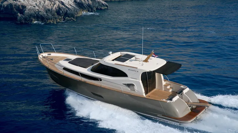 450 Rs Yacht Photos Pics Luxurious 2026 Monachus 450 RS yacht cruising on blue ocean waters.
