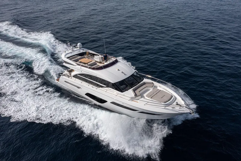  Yacht Photos Pics Luxury 2020 Princess F70 yacht cruising on open sea, aerial view.