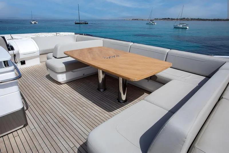  Yacht Photos Pics Luxurious 2020 Princess F70 yacht deck with elegant seating and ocean view.