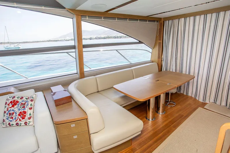  Yacht Photos Pics Luxurious interior of 2020 Princess F70 yacht with elegant seating and ocean view.