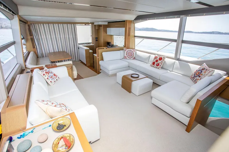 Yacht Photos Pics Luxurious interior of 2020 Princess F70 yacht with elegant white seating and ocean view.