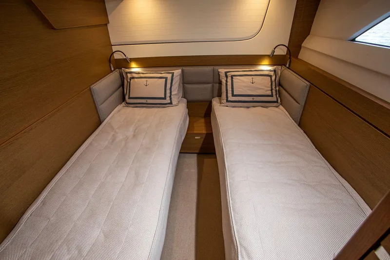  Yacht Photos Pics Twin cabin interior of 2020 Princess F70 yacht with modern design and cozy lighting.