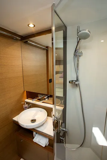  Yacht Photos Pics Luxurious bathroom in 2020 Princess F70 yacht with modern shower and sleek design.