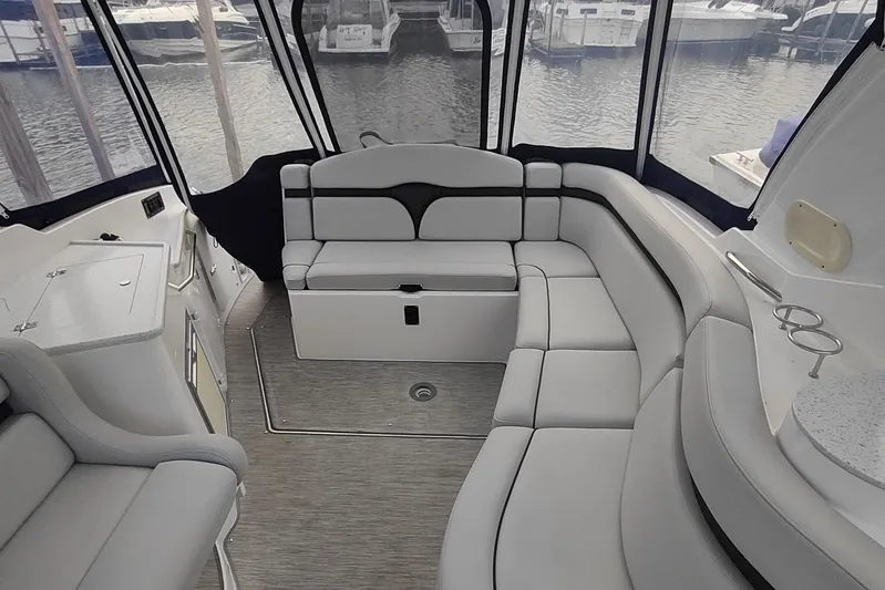  Yacht Photos Pics 2017 Rinker EX 320 boat interior with spacious seating and modern design.