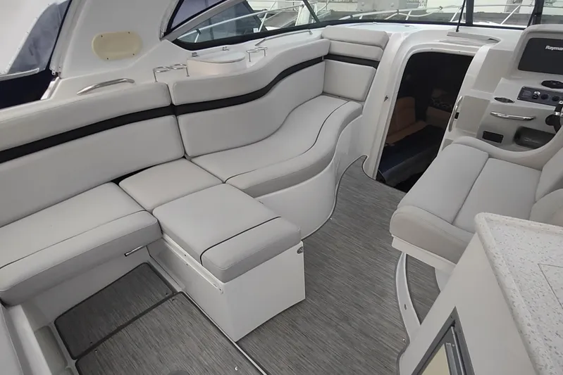  Yacht Photos Pics 2017 Rinker EX 320 boat interior with plush seating and modern design.